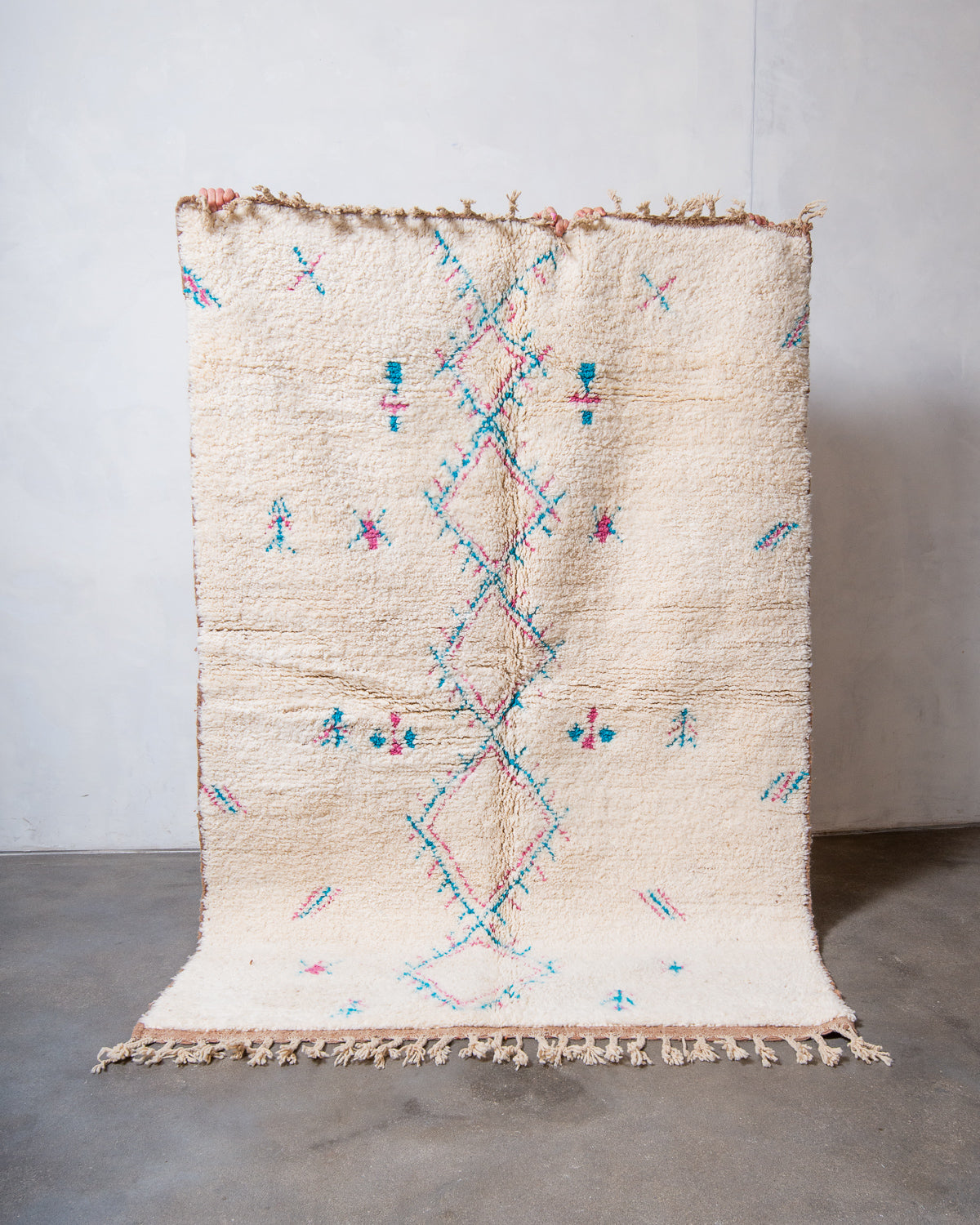 Modern, designer, handcrafted Berber rug from Morocco. Beniourain carpet with beautiful colours and patterns and fluffy wool texture.